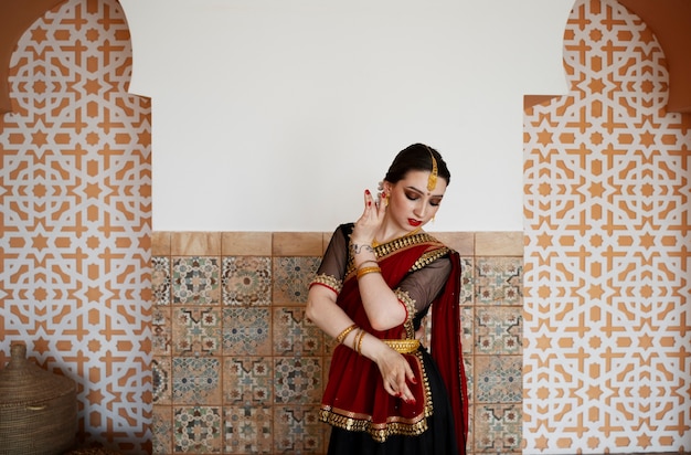 Beautiful young woman wearing sari