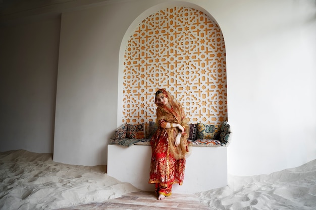 Free photo beautiful young woman wearing sari