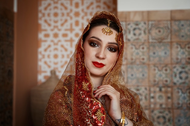beautiful young woman wearing sari