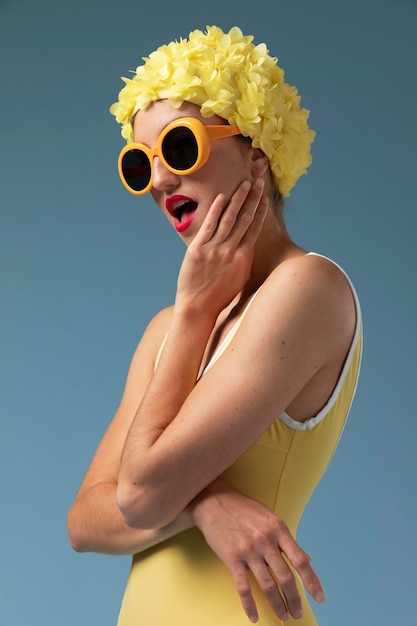 Beautiful young woman with swimming cap