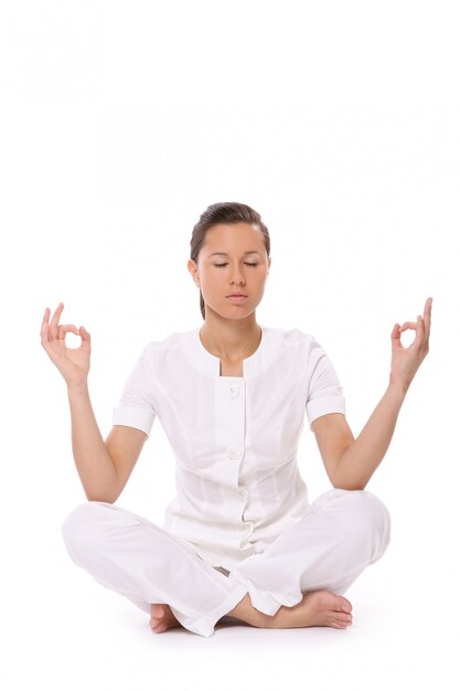 A beautiful young woman in yoga pose