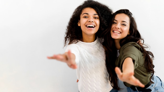 Beautiful young women posing together