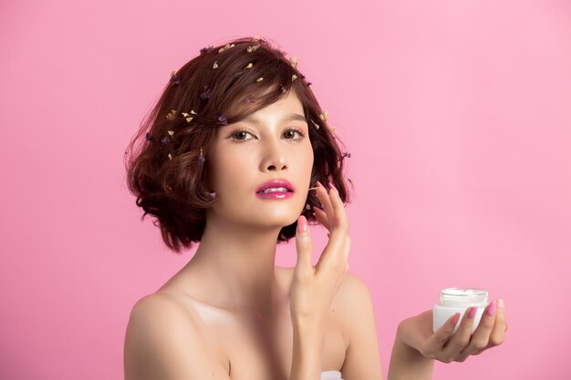 Beauty Concept. woman holds a moisturizer in her hand