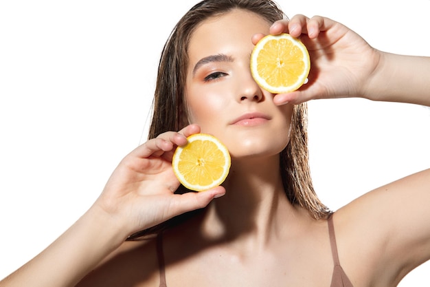 Beauty Day. Woman wearing towel doing her daily skincare routine