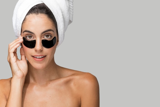 Free photo beauty under-eye patches copy space