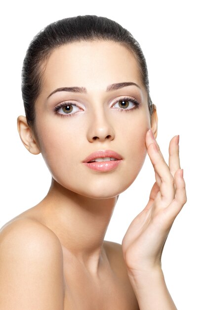 Beauty face of young woman. Skin care concept. Closeup portrait isolated on white.