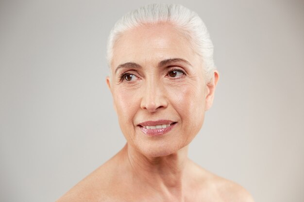 Beauty portrait of an attractive naked elderly woman