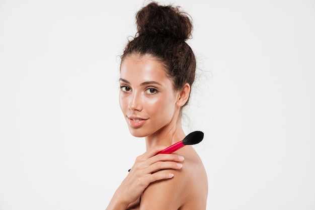 Beauty portrait of a smiling brunette woman