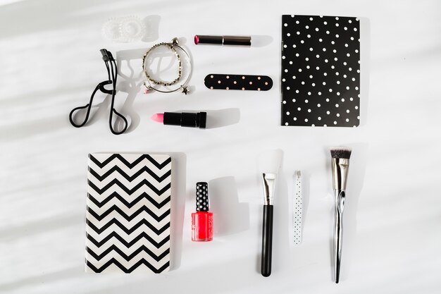 Beauty supplies near stylish notebooks