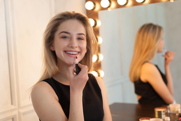 Beauty woman applying makeup