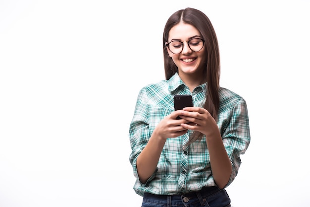 Free photo beauty woman using and reading a smart phone on a white