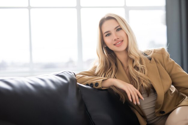 Beauty woman with white smile looking at camera at home