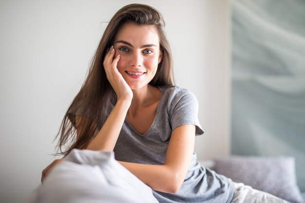 Beauty young woman with white perfect smile  at home