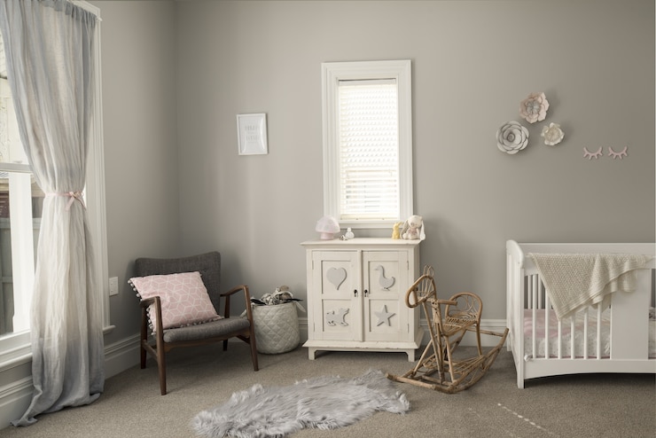 Free Photo bedroom of a baby with light-colored furniture and walls