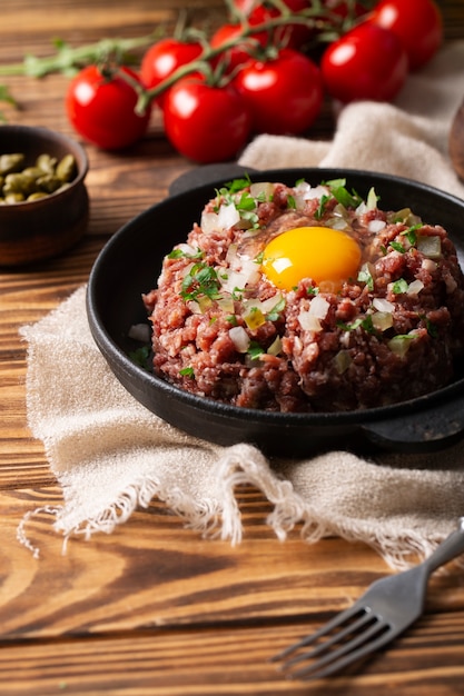 Free photo beef steak tartar still life