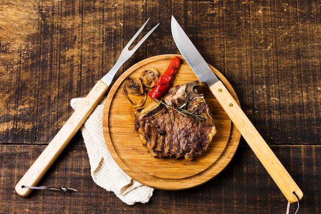 Beefsteak portion on rustic table