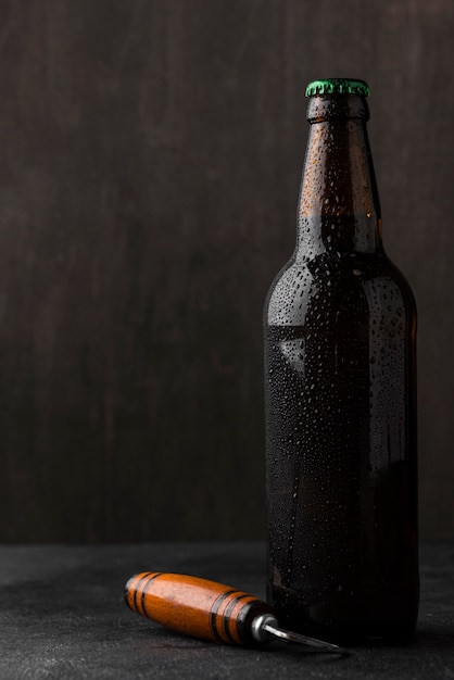 Beer bottle and opener arrangement