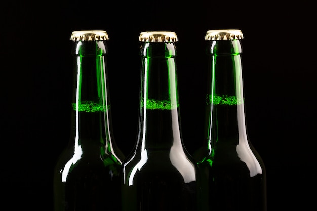 Beer bottles standing on a row