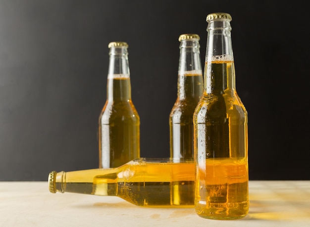 Beer bottles on a wooden table