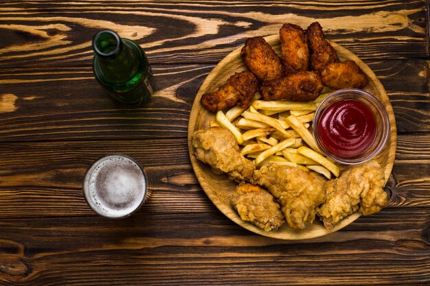 Beer and chicken with French fries