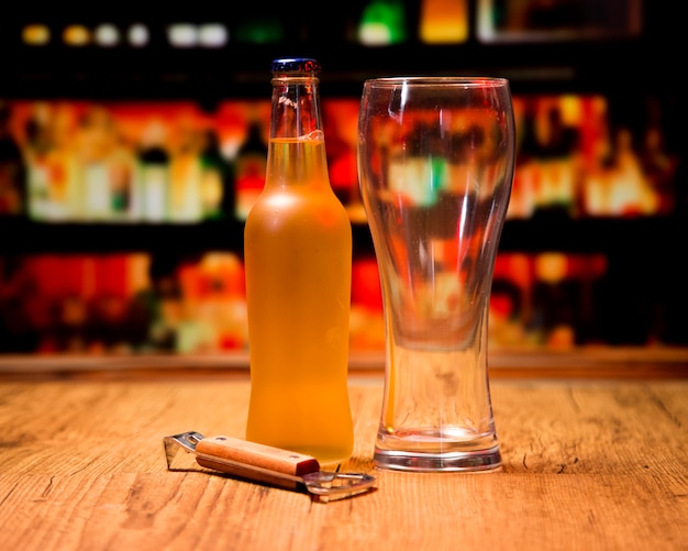 Beer glass with bottle and opener