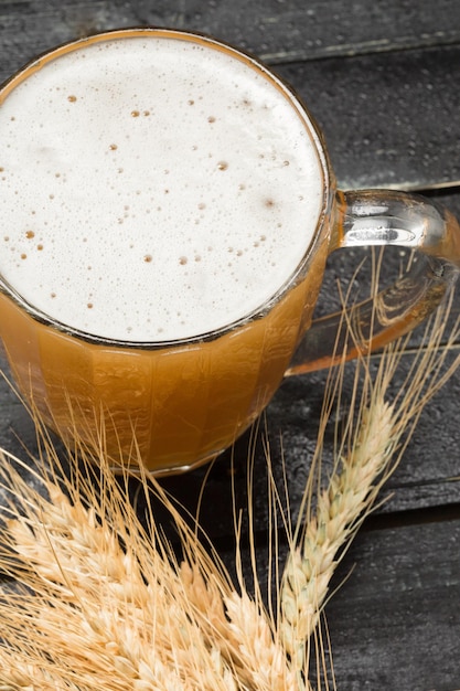 Beer glass on a wooden background