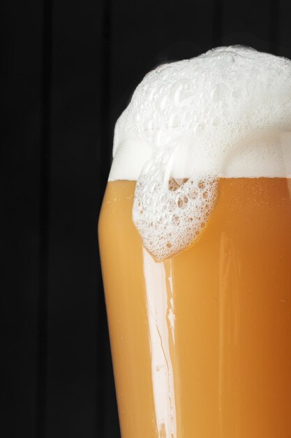 Beer glass on a wooden background