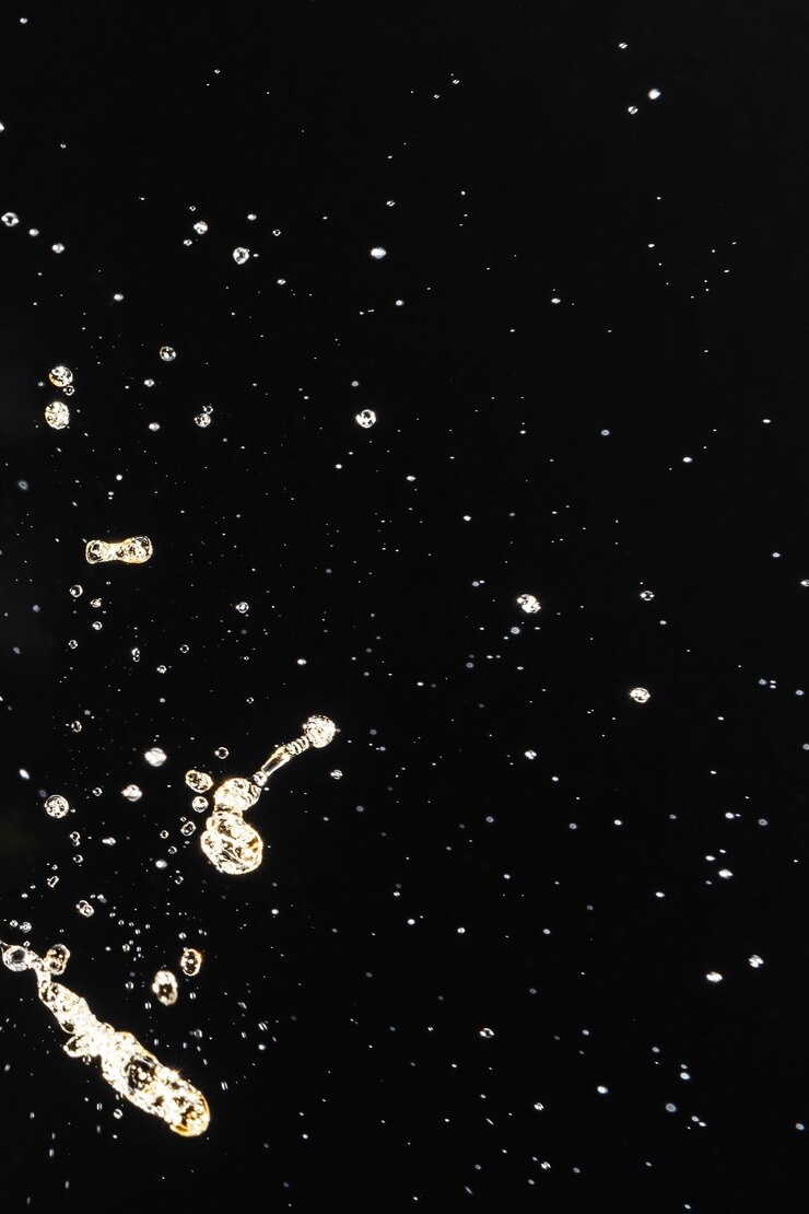 Free Photo beer splatter on black image