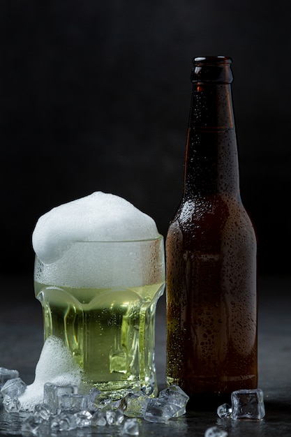 Free photo beer with crispy fish hors d'oeuvres, world beer day.