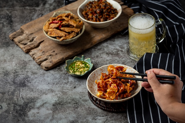 Beer with crispy fish hors d'oeuvres, World Beer Day.