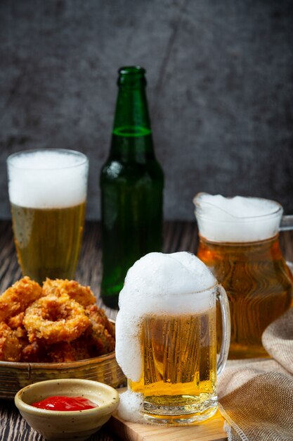 Beer with crispy fish hors d'oeuvres, World Beer Day.