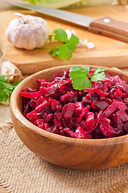 Beet salad Vinaigrette in a wooden bowl