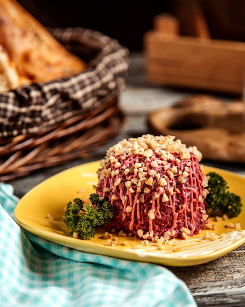 Beetroot salad walnut and mayonnaise side view