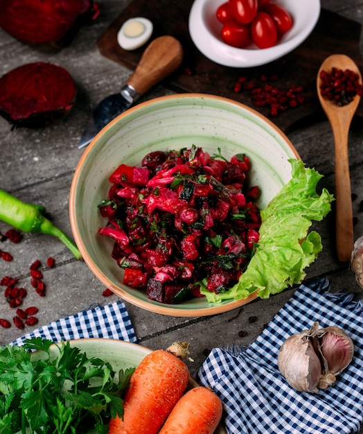 Beetroot salad with beets and beans on the table