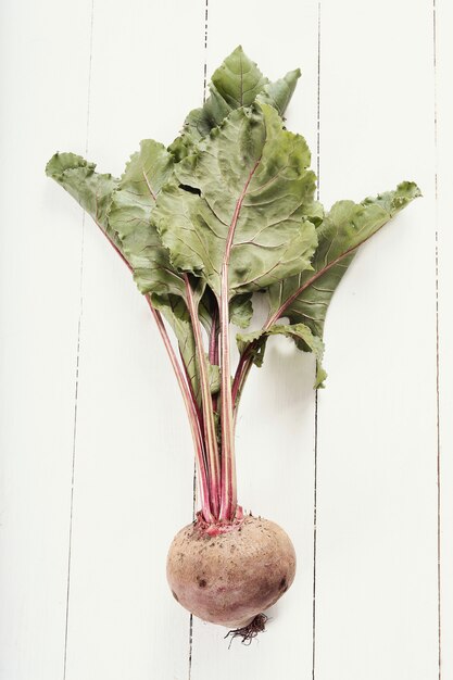 Beetroot on white wooden table.