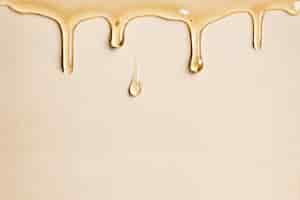 Free photo beige background wallpaper dripping oil border