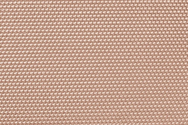 Beige colored honeycomb pattern wallpaper