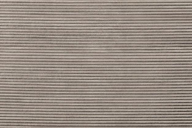 Beige corduroy fabric textured background