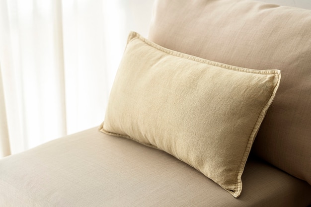 Beige cushion home decor, on a sofa