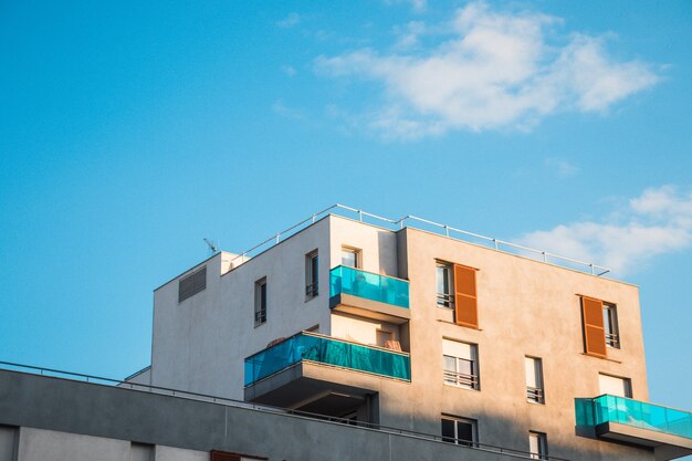 Beige and green building during day