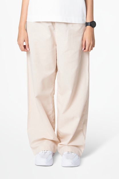 Beige loose pants and white tee women’s fashion closeup