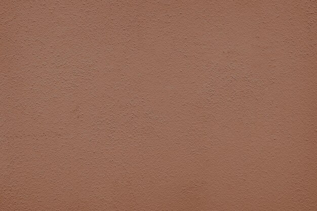 Beige wall texture background with paint droplets