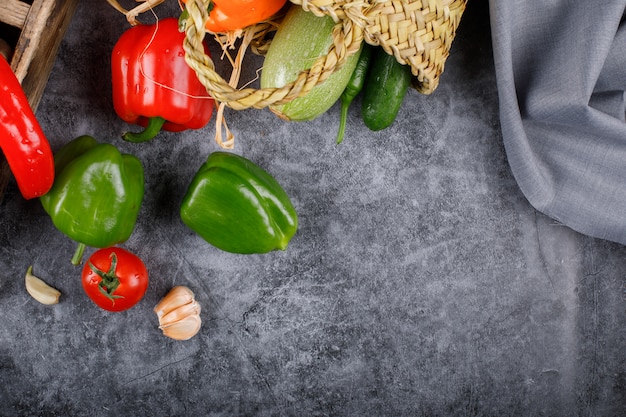 Bell peppers on a blue table.