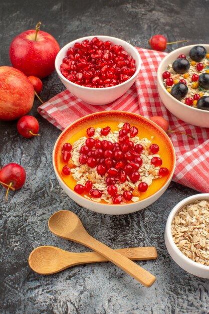 berries wooden spoons cherries grapes oatmeal apples pomegranate