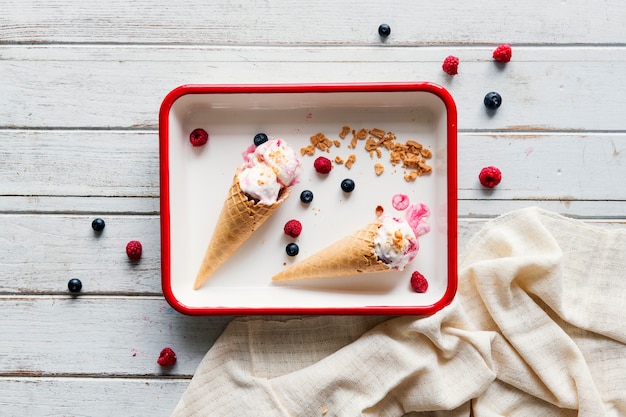 Berry ice cream in waffle cones