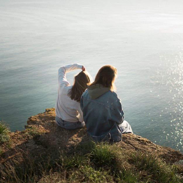 Best female friends and ocean