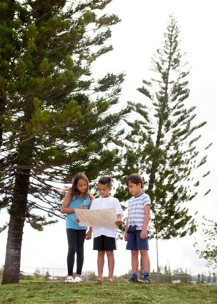Best friends participating in a treasure hunt outdoors