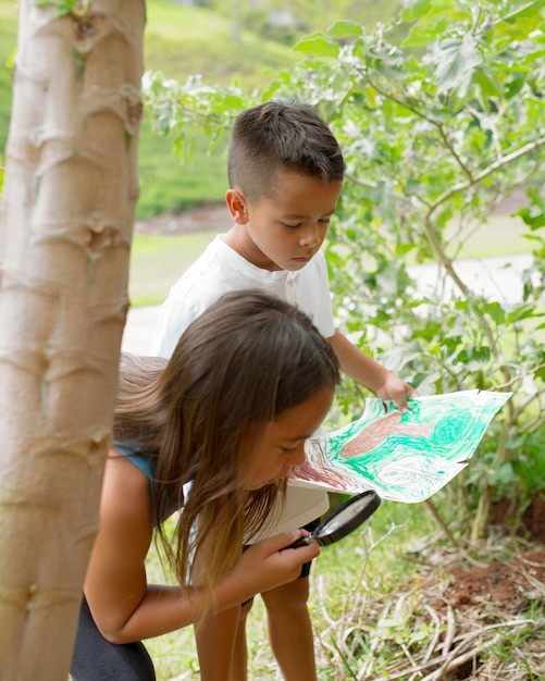 Best friends participating in a treasure hunt outdoors