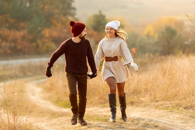 Best friends running together while holding hands