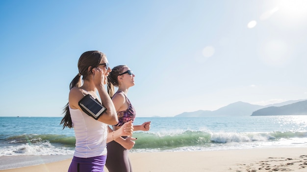 Best friends training on the beach